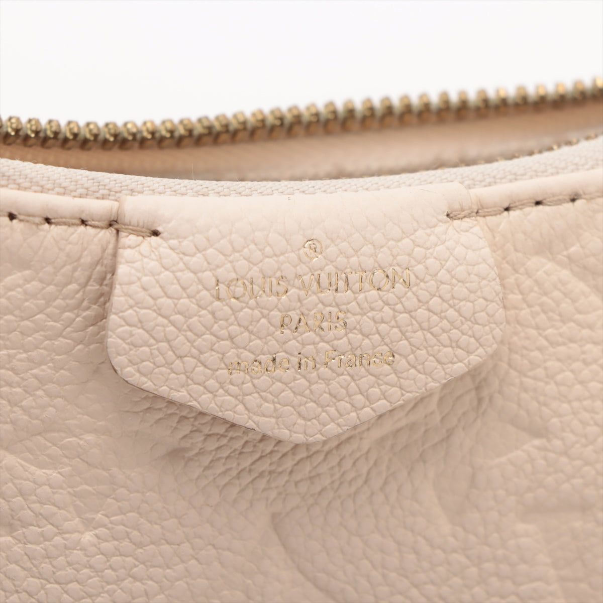Designer Louis Vuitton Monogram Empreinte Easy Pouch On Strap Creme
